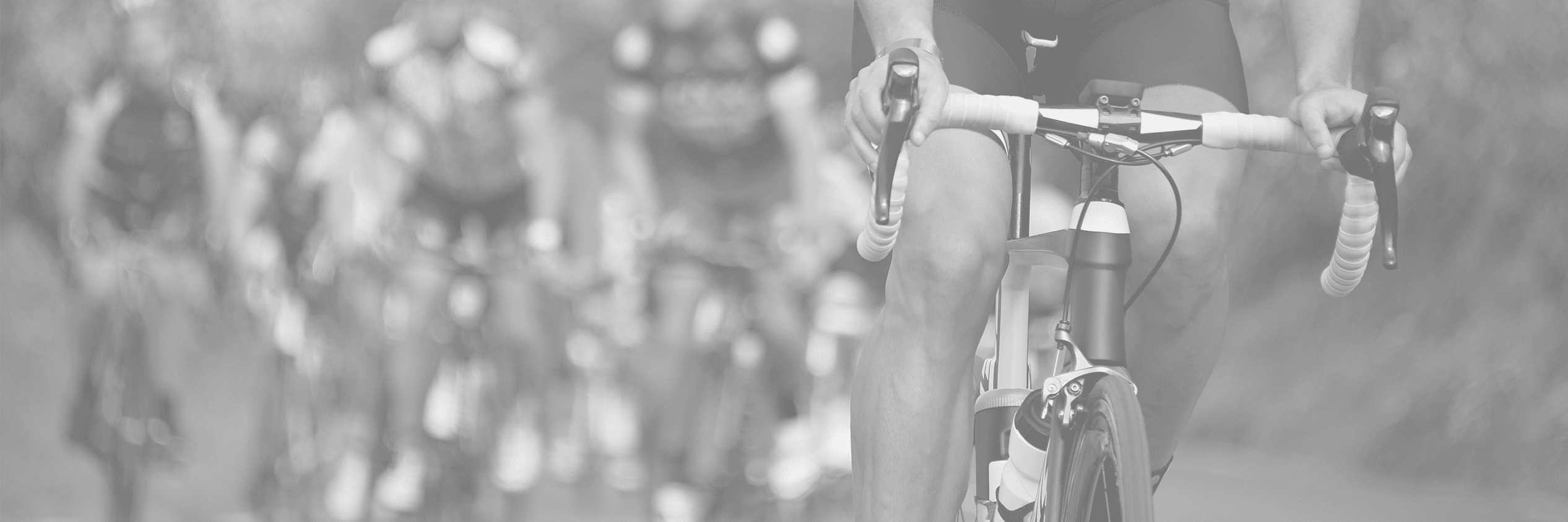 close up of cyclist leading peleton